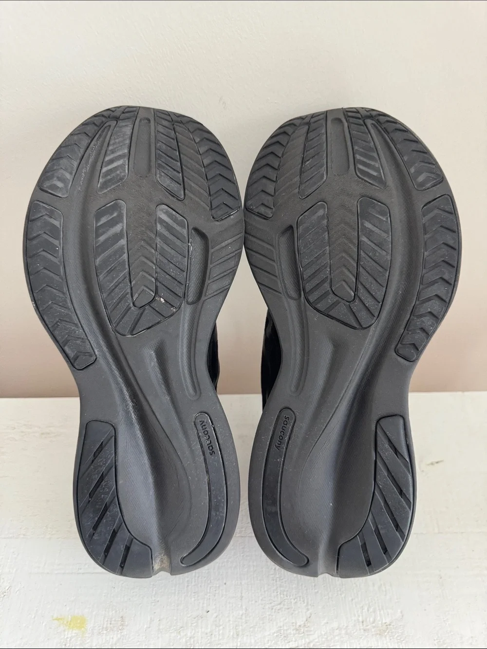 Women’s Saucony Ride 15 All-Black Running Sneakers.